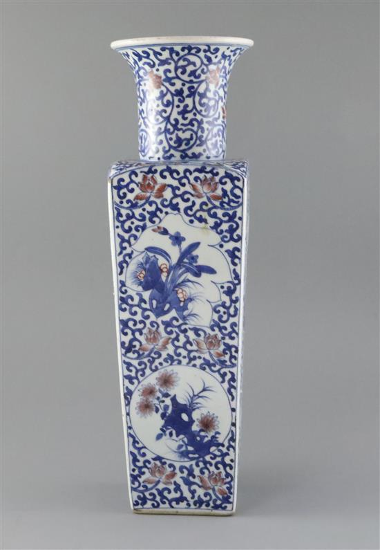 A Chinese underglaze blue and copper red square baluster vase, late Qing dynasty, H. 43.5cm